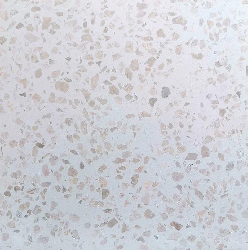 Pale terrazzo tile reference with cream and white fragments.